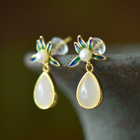 925 Perak Bertatahkan Hetian Jade Qinghai Bahan Jatuhkan Anting Enamel Anggrek (Emas Tebal) Gaya baru dan modis, batu gioknya hangat dan halus Spesifikasi batu giok: (6 * 9) Termasuk pajak pengiriman