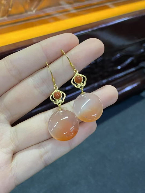 Anting-Anting Terapung Es Nan Hong Alami Anting-anting gaya Cina baru yang murah hati dan temperamen dengan ukuran sekitar 16-17mm bertatahkan perak 925. Termasuk pajak pengiriman