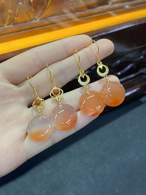 Anting-Anting Terapung Es Nan Hong Alami Anting-anting gaya Cina baru yang murah hati dan temperamen dengan ukuran sekitar 16-17mm bertatahkan perak 925. Termasuk pajak pengiriman