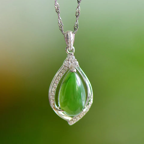 10493 Set Kalung Tetesan Air Mata Giok Hetian Jade Alami dari Perak 925. Gayanya baru dan unik, gioknya hangat dan halus, dan efeknya menarik dan menarik.