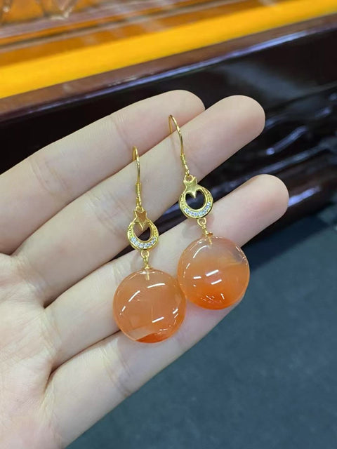 Anting-Anting Terapung Es Nan Hong Alami Anting-anting gaya Cina baru yang murah hati dan temperamen dengan ukuran sekitar 16-17mm bertatahkan perak 925. Termasuk pajak pengiriman