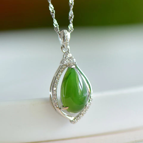 10493 Set Kalung Tetesan Air Mata Giok Hetian Jade Alami dari Perak 925. Gayanya baru dan unik, gioknya hangat dan halus, dan efeknya menarik dan menarik.